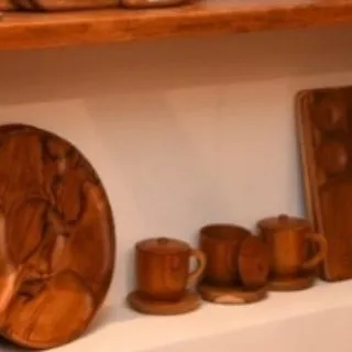 A collection of my lidded teak cups and saucers, perfect for serving tea or coffee. These pieces bring the warmth and natural elegance of wood to your table.