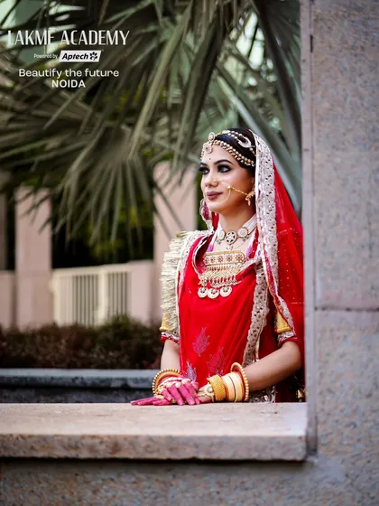 A candid-style shot of a Rajasthani bride. We teach our students to create makeup that looks beautiful from every angle and in every lighting situation, whether posed or natural.
