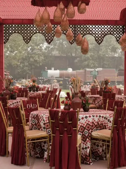 The guest seating at the Souk-themed Mehendi. We used patterned tablecloths, rustic hanging baskets, and traditional chair ties to carry the theme through the entire space.