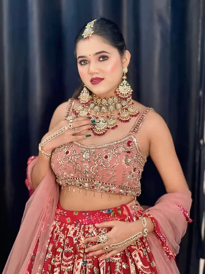 A stunning reception look for a modern bride. This style features bold eyes and a defined lip, paired with an elegant hairstyle, showing my versatility for all your wedding events.