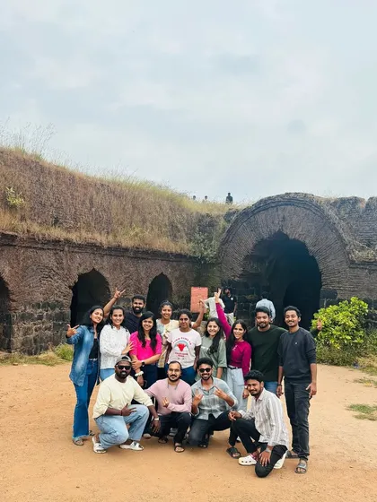 Trekking with me is about making memories with great people. Here's one of my happy groups after a rewarding climb at Kumaraparvatha, posing by the historic fort structure on the trail.