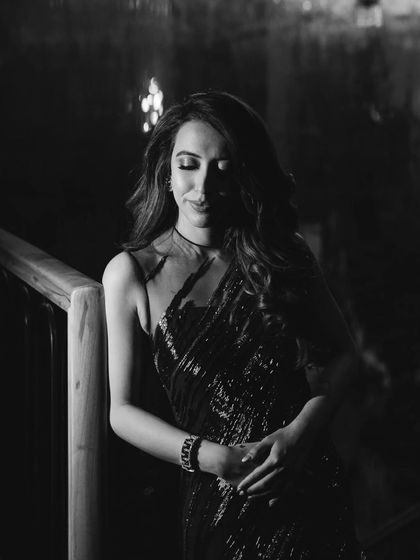 A quiet, intimate portrait of the bride at her cocktail party, captured in a moment of serene reflection.