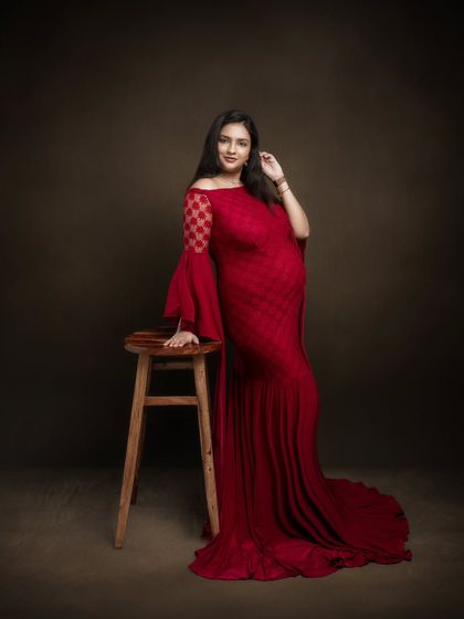 Capturing this stunning mommy-to-be in her glowing journey was no less than creating a masterpiece in this beautiful red gown.