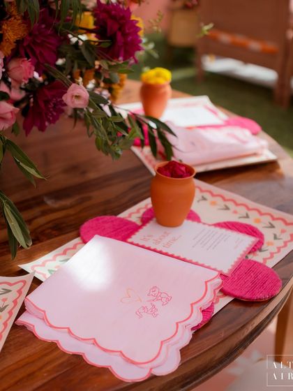 The tablescapes for the 'Gulbahar' event featured custom-designed placemats and embroidered napkins with the couple's initials, showing how even the smallest details can be personalized to tell their story.