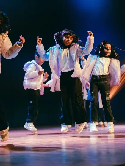This is the moment it's all about. The pure joy and confidence shining on stage during our annual performance night. We work to give every child this feeling of accomplishment and excitement.