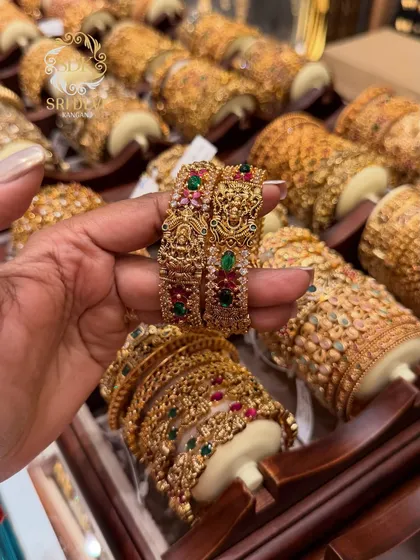 Another view of our intricate temple jewellery kadas. The craftsmanship on these antique bangles is exceptional, designed to give you a grand and traditional look for weddings and festivals.