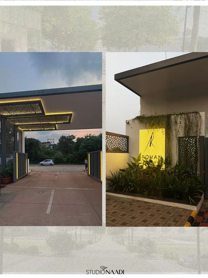 The entry gate for Rohan Estate in Mangaluru, illuminated at dusk. The design features backlit perforated panels and integrated lighting, creating a warm and welcoming beacon for the residential community.