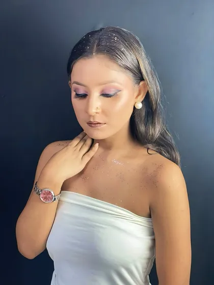 A closed-eye shot showing the soft pink airbrushed eyeshadow, a difficult technique that our students master through practice.