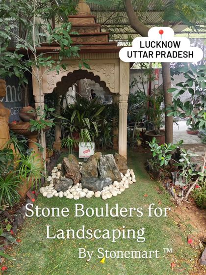 Our stone boulders are perfect for creating focal points in landscape designs. Here, they are arranged in a natural cluster, ready to bring a sense of permanence and style to an outdoor garden.