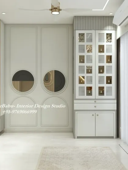 A modern puja cabinet with jali-patterned doors, integrated into the living room design. This is a perfect solution for creating a sacred space in a compact apartment.