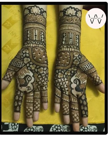 A detailed design featuring peacocks and a mix of traditional Indian patterns.