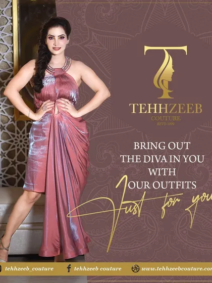 Bring out your inner diva with this shimmering pink gown. The metallic fabric and draped silhouette create a look that is both glamorous and effortlessly chic, perfect for a cocktail party or evening event.