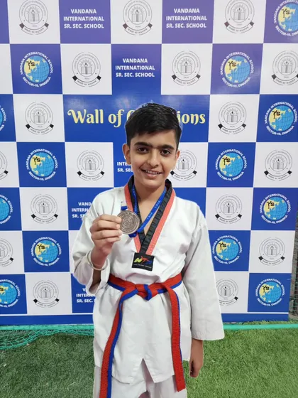 My student Utkarsh Chopra with his silver medal from the CBSE Taekwondo Championship 2023. His performance secured his spot at the CBSE Nationals.