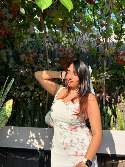 A sunny day at Rubarr Galleria. The floral background and my floral dress create a perfect, cohesive look.