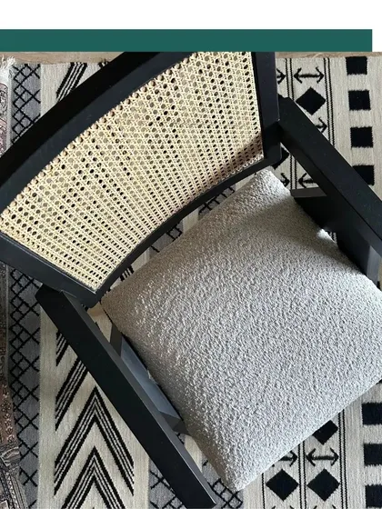 Our modern interpretation of the iconic Chandigarh Chair pays homage to Pierre Jeanneret's legacy. Crafted from sustainably certified oak wood with a natural cane back, this piece blends classic mid-century design with contemporary craftsmanship for a timeless aesthetic.