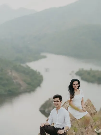A serene portrait set against the breathtaking backdrop of Udaipur's lakes and Aravalli hills. We position our couples to capture both their connection and the majestic, painterly landscape that makes the city so iconic.