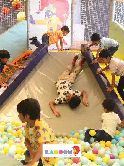 The best kind of chaos! Kids climbing, sliding, and playing together in our main play structure and ball pit.