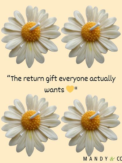 Four of my classic white and yellow daisy candles. This is the return gift that everyone actually wants to receive.