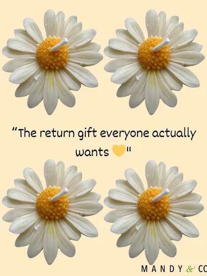My daisy candles, touted as "the return gift everyone actually wants," a beautiful and practical token of appreciation.
