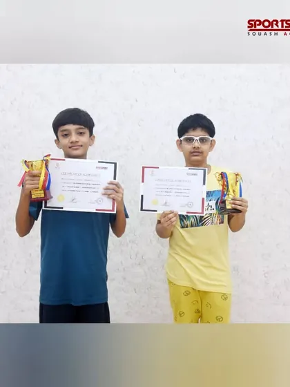 Young champions proudly display their certificates and trophies after the squash tournament. Recognizing and encouraging youth participation is a core part of my mission.