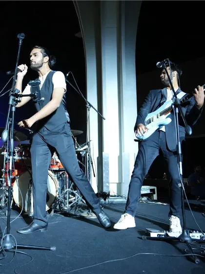 A shot of our lead singer and guitarist performing together. We ensure our stage presence is as engaging and energetic as our music.