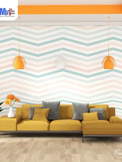 A playful chevron pattern can bring so much energy to a living room. I work with clients to select patterns and colors that match their furniture and create a fun, harmonious atmosphere. This is a popular choice for wall design.