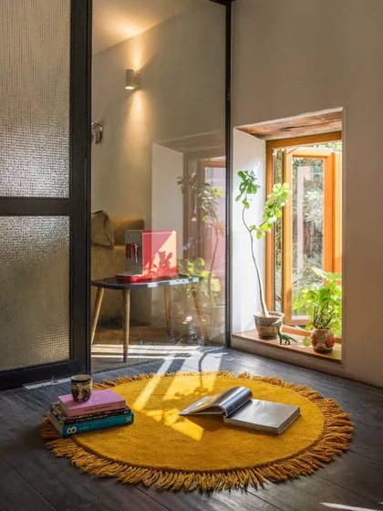 Even the smallest corners can hold the biggest feelings. This quiet reading nook in my studio is my personal happy place, where sunlight streams in through the window. It’s a simple corner with a few of my favorite things, a reminder that a home is built from moments of peace.