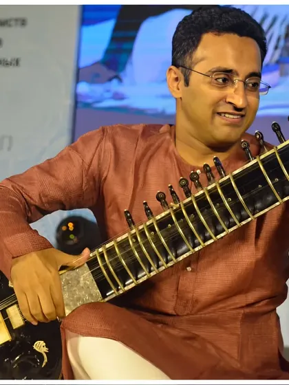 A pleasant moment on stage, connecting with the audience through the universal language of music.