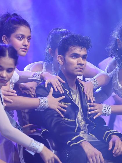 A dramatic moment captured on stage at RUH. Our showcases give students the experience of a professional production with full costumes and lighting.