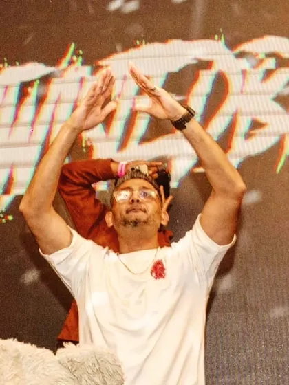 A shot of me raising the roof during a Christmas event at Toy Room, Pune. The holiday energy combined with the club vibe was something special.
