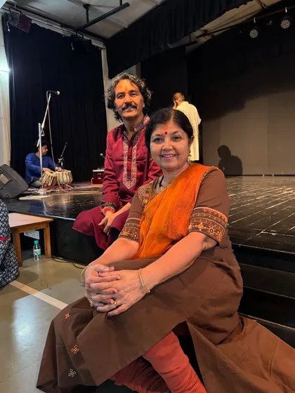 A candid moment between my mother and another esteemed artist backstage. These are the moments of camaraderie and shared respect that enrich our artistic community.