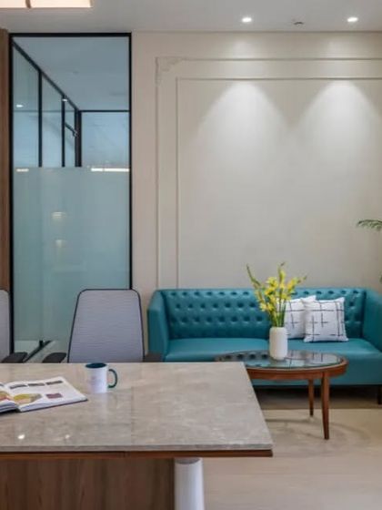 From the perspective of the executive, this view shows the well-appointed seating area for guests. The design ensures the entire room feels connected and functional for various types of interactions.