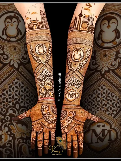 Your story is global, and your mehndi can be too. This truly unique design was customized to include the skylines of Mumbai and Toronto, blending two worlds into one beautiful piece of art, complete with adorable penguin motifs.