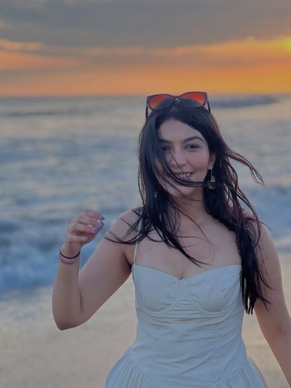 A sunset shot from my Bali trip. A simple white dress is a must-have for any beach vacation wardrobe.
