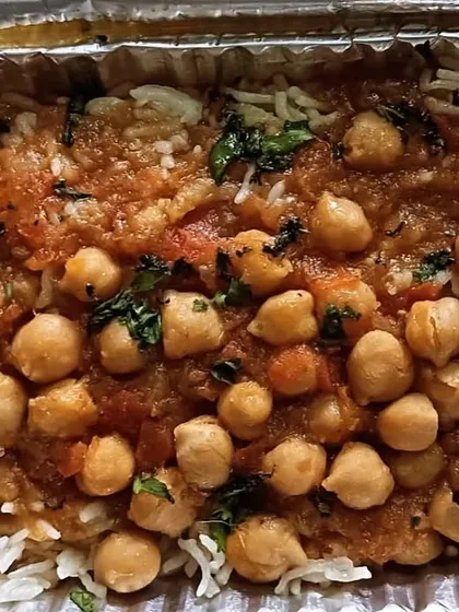 A serving of Chana Masala with rice. It's a slightly different preparation from my Punjabi chole, with its own unique taste.