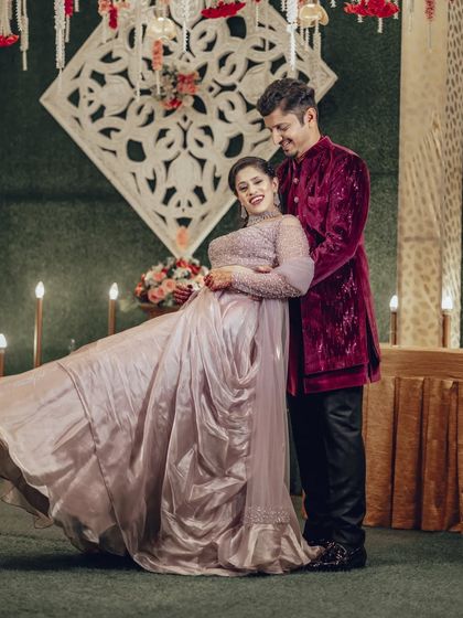 A dynamic photo capturing the bride's twirl and the beautiful flow of her gown. I love incorporating movement to add life and energy to your couple portraits.