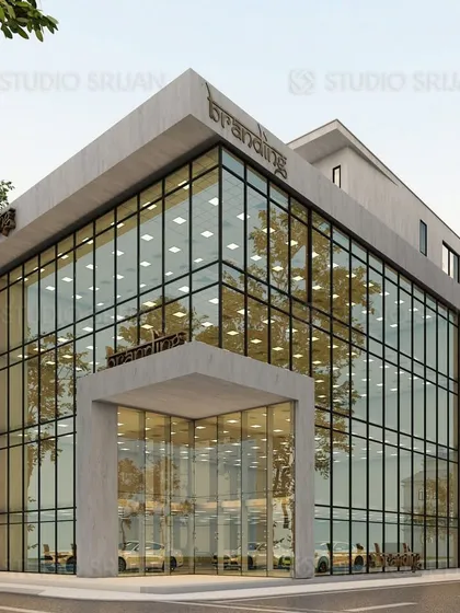 Beyond homes, we apply our architectural principles to commercial spaces. This 436 sq. yard commercial building in Janakpuri features a bold, concrete frame and an expansive glass curtain wall, creating an impressive and transparent facade designed for maximum street presence.
