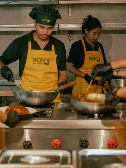 Here is my team, the NCF family, working together in the kitchen. We put love and care into every dish we prepare for your events.