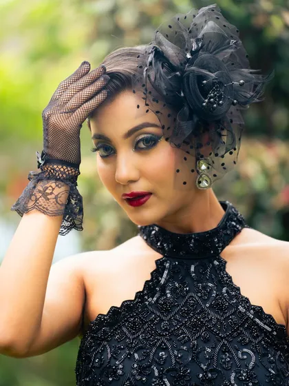 An outdoor shot that shows how this dramatic makeup looks in natural light. The look is still powerful and captivating.