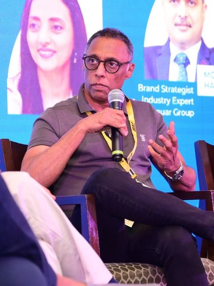 Discussing innovative solutions to combat climate extremes through architecture at the IDAC Nagpur event.