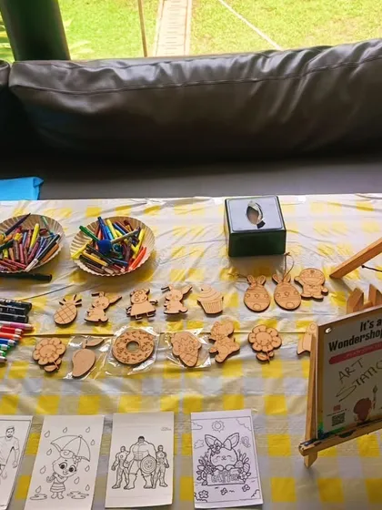 Here is the full art station setup for the fridge magnet and coloring activity. I provide a variety of wooden cutouts, markers, and coloring sheets to choose from.