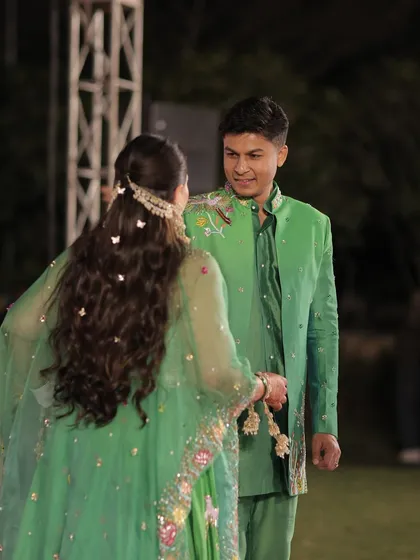 Another shot of the couple enjoying their special night. The bride's hair looks perfect even while dancing.