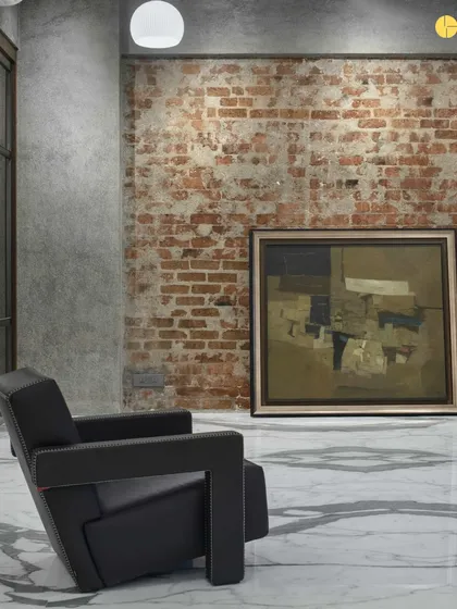Another shot of the 'blank slate' at 'The Canvas.' An empty room with exposed brick and a lone armchair, waiting for the layers of design to be added.
