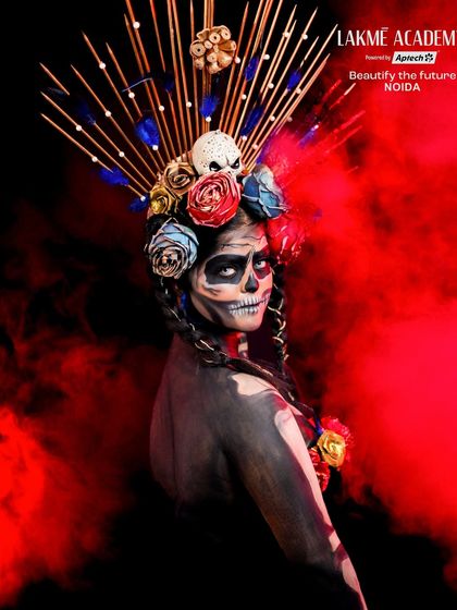 An award-winning illusion makeup look from our student competition. This "Cover Girl" creation features a skull illusion with a floral headpiece, showcasing incredible talent.