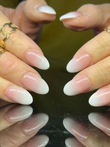 A clean and simple baby boomer ombre on almond nails, a timeless and versatile choice.