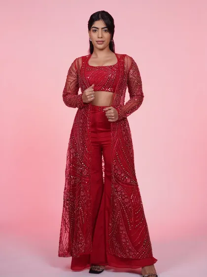 Another look at the red three-piece Indo-Western set, a perfect choice for anyone wanting to make a bold fashion statement.