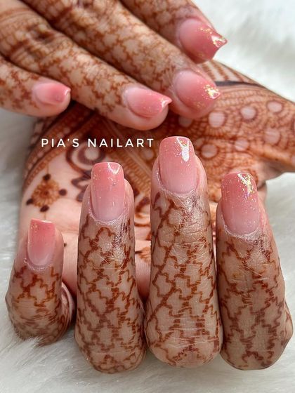 Another view of the soft airbrush ombre, showing how the light catches the subtle glitter. It's a perfect match for any bridal occasion.