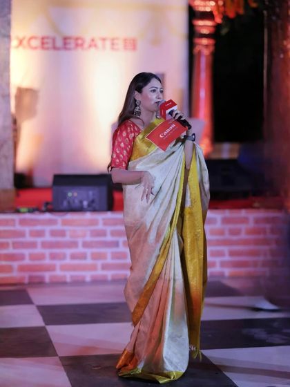 Hosting a segment at the Canon corporate event in Kovalam. My bilingual skills allow me to connect with a diverse audience, ensuring no one feels left out.