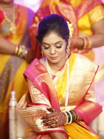 A serene moment captured during the rituals. The focus is on her flawless skin and the subtle shimmer on her eyes, creating a look of timeless grace.