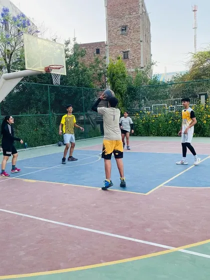 A player sets up for a shot, demonstrating good balance and preparation.